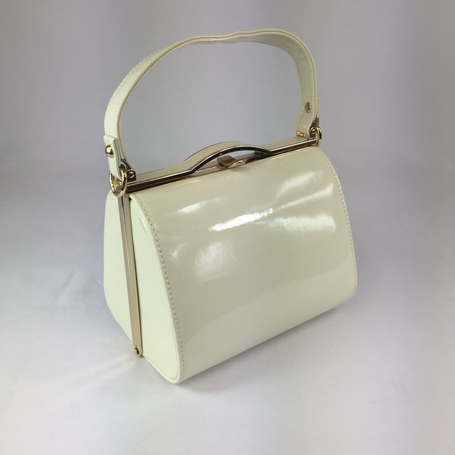 3 Classic Handbag Styles Every Girl Should Own | The Teacher Diva: a Dallas  Fashion Blog featuring Beauty & Lifestyle | Purse outfit, Kate spade  handbags, Classic handbags